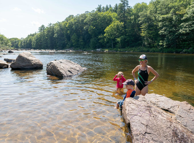 livermore falls swimmers on rocks