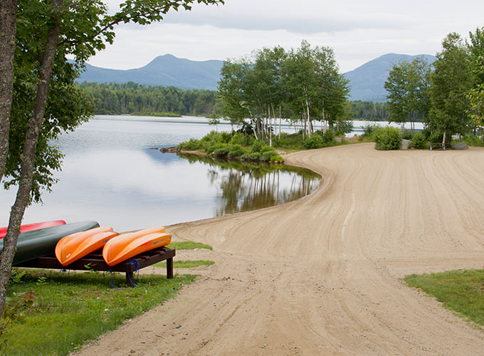 View of beach with mountains in background