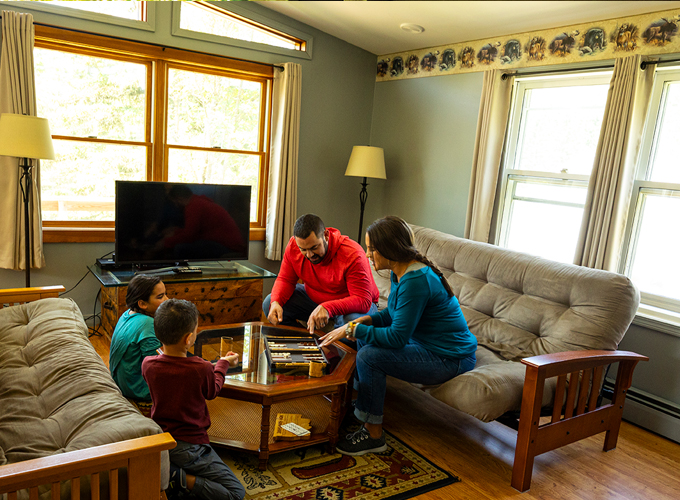 coleman lodges family playing boardgame