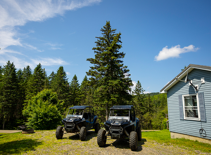 coleman whiskey jack lodge house with atvs
