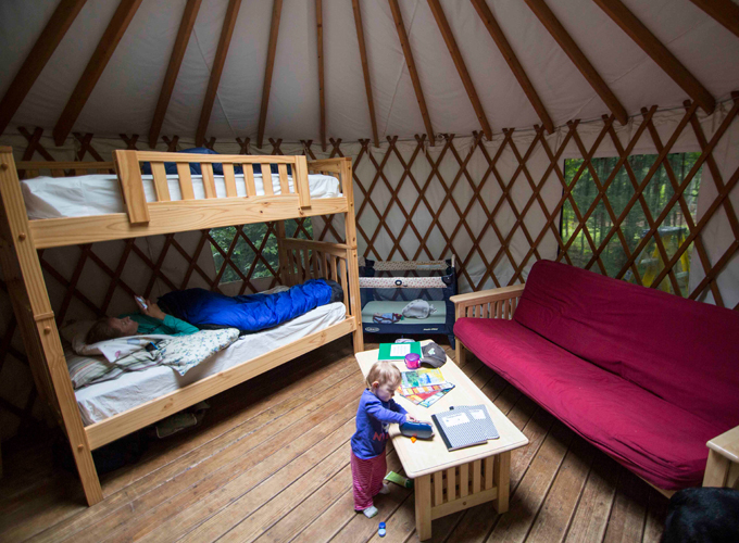 inside yurt at milan hill state park-child playing