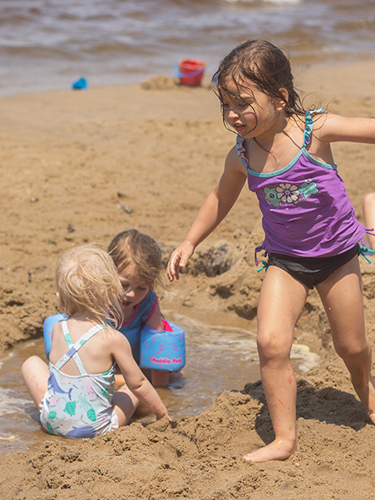 kids at ellacoya state park beach