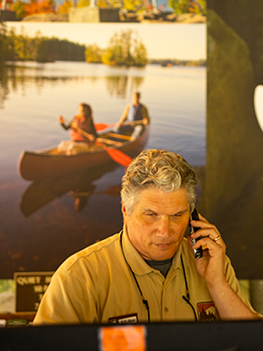 male retiree employee at front desk pawtuckaway