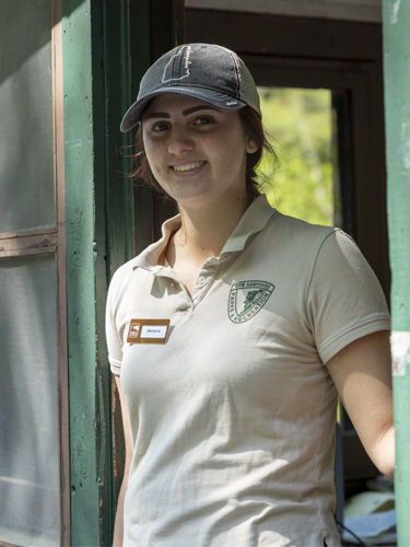young woman in park toll booth