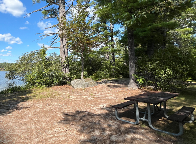 picnic tables at campers beach greenfield state park