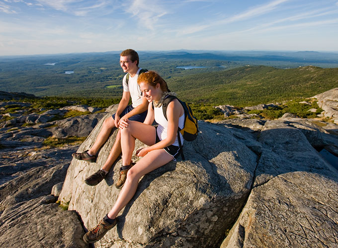 hiker on summit of mt monadnock