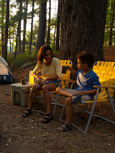 mother and son fireside at pawtuckaway campsite