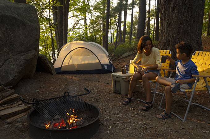 mother and son fireside at pawtuckaway campsite