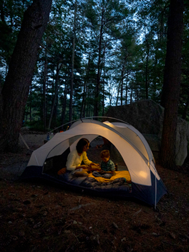 camping at night in tent at pawtuckaway state park