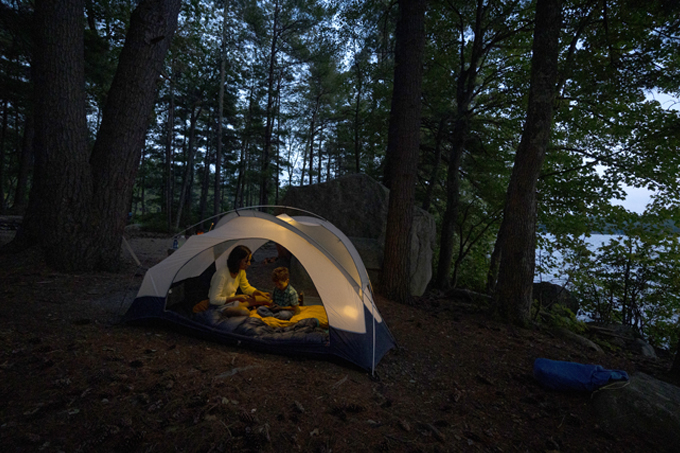 camping at night in tent at pawtuckaway state park