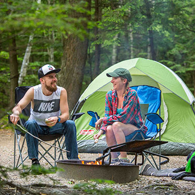 A family camping at night