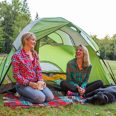 A family camping at night