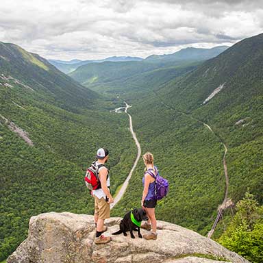 A couple hiking in a park