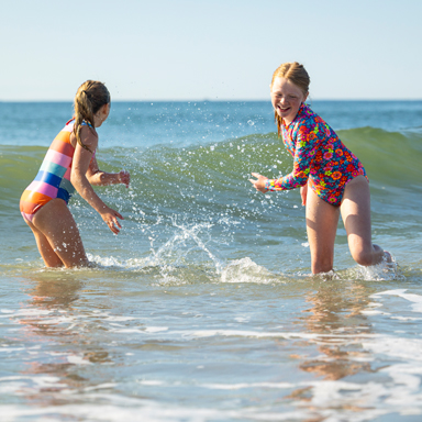 two young girls playing at north beach hampton