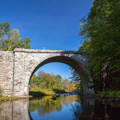 stone bridge over monadnock rail trail