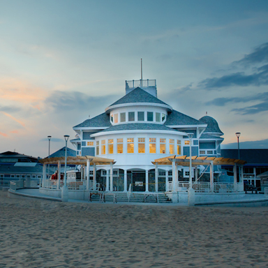 sunset view of hampton seashell building during wedding