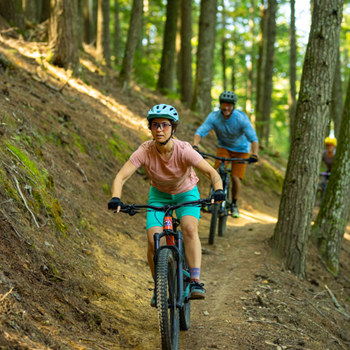 woman and man mt biking at bear brook state park