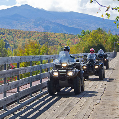 A OHRV club riding on a trail