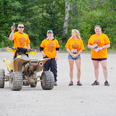 People using recreational vehicles on a trail