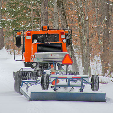 People using recreational vehicles on a trail