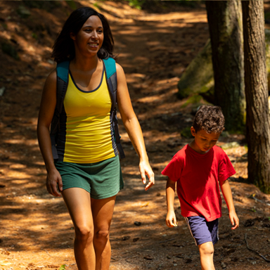 woman and child on a trail in pawtuckaway