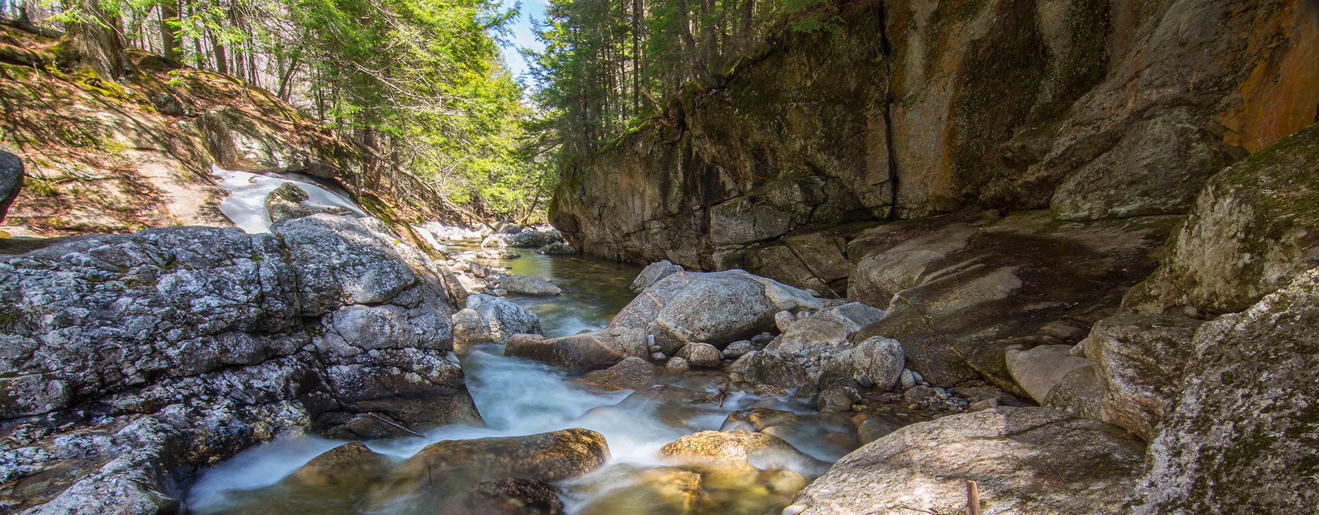 sculptured rocks waterfall in spring