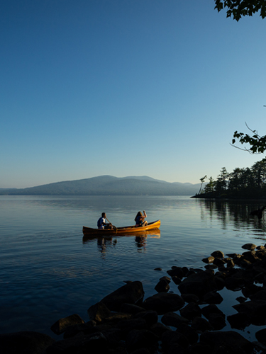 couple canoeing on new found lake - wellington state park