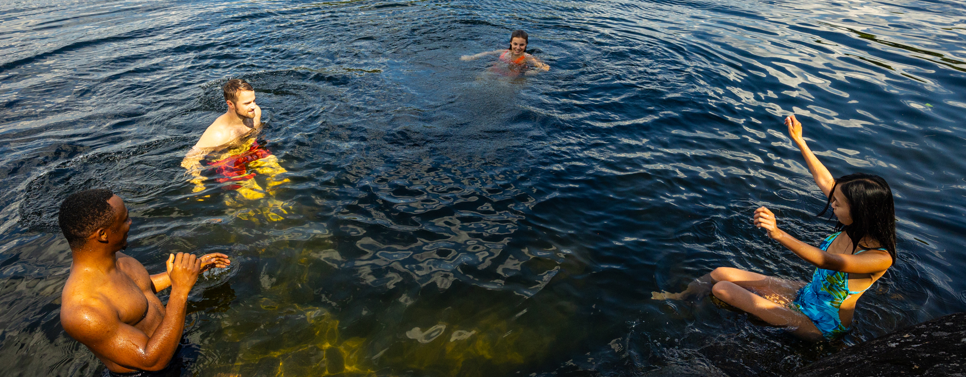 millennials swimming at nh state park