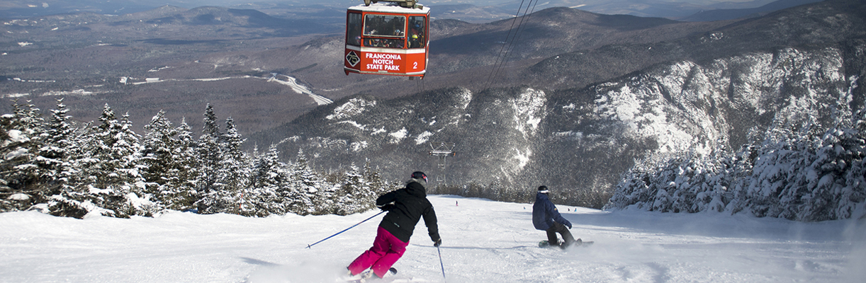 skiing and riding at cannon under tram
