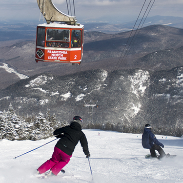 skiing and riding at cannon under tram