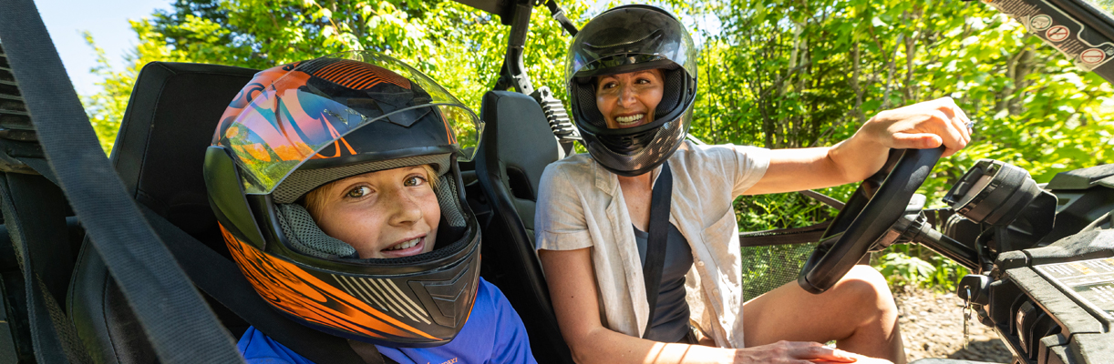 mother and son close up in side by side ATV at jericho mountain state park 