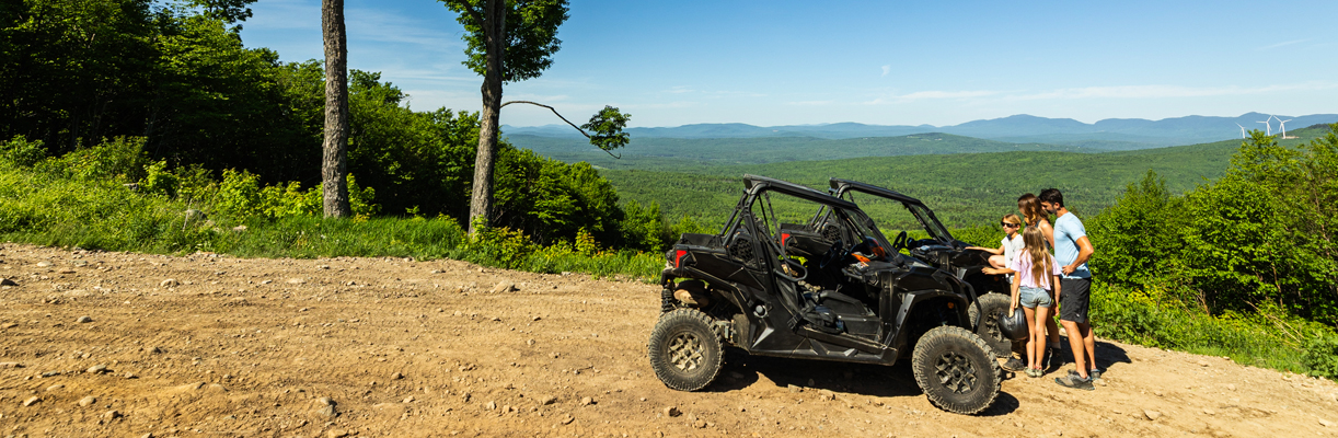family with ATV at outlook at jericho mountain state park 