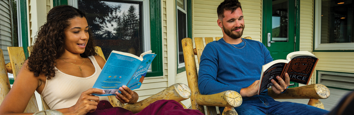 couple reading at the main lodge at coleman state park