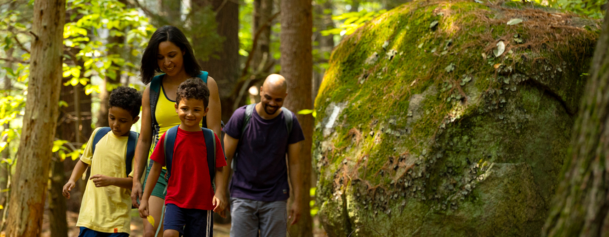 family hiking at pawtuckaway state park
