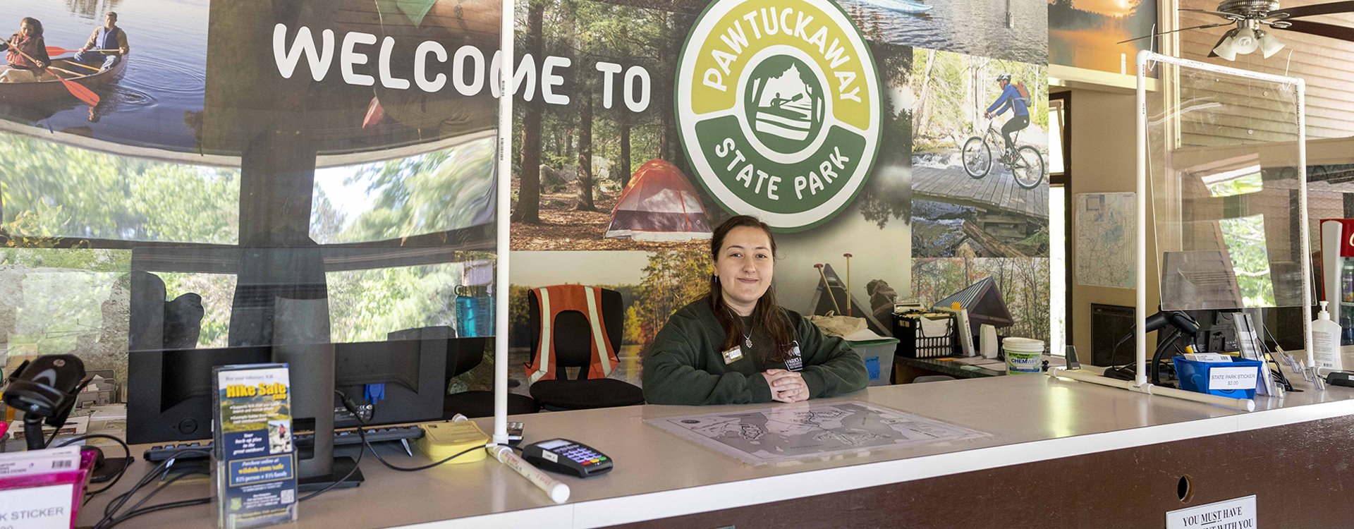 park employee at reception desk at Pawtuckaway