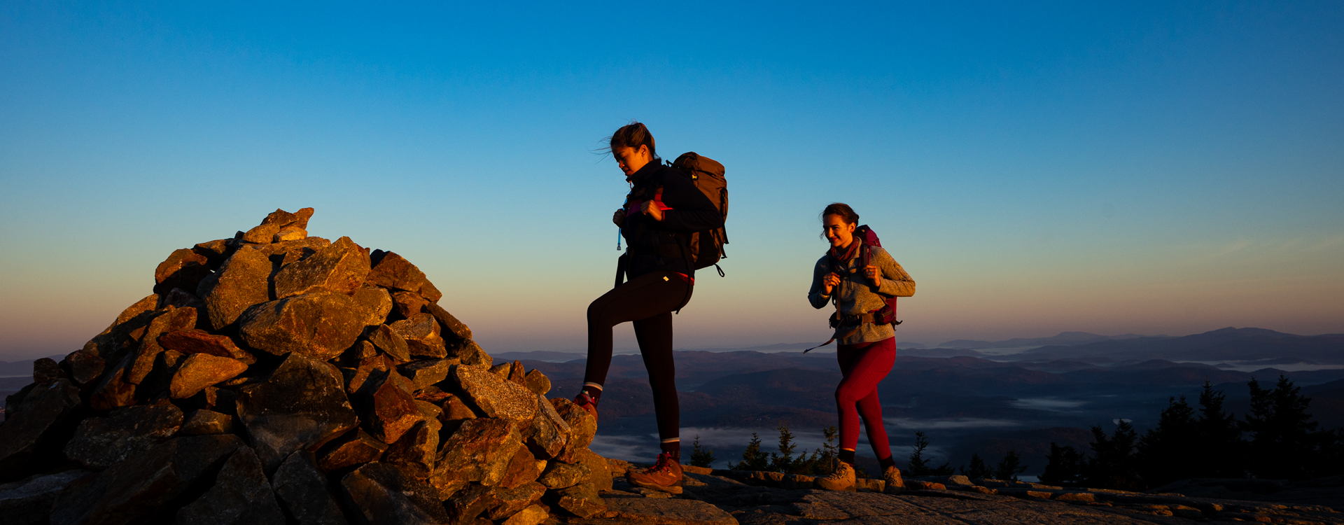 two young women hiking at rollins state park