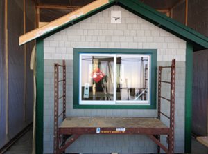 Cabin with green trim