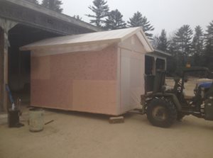 Cabin being pulled by tractor