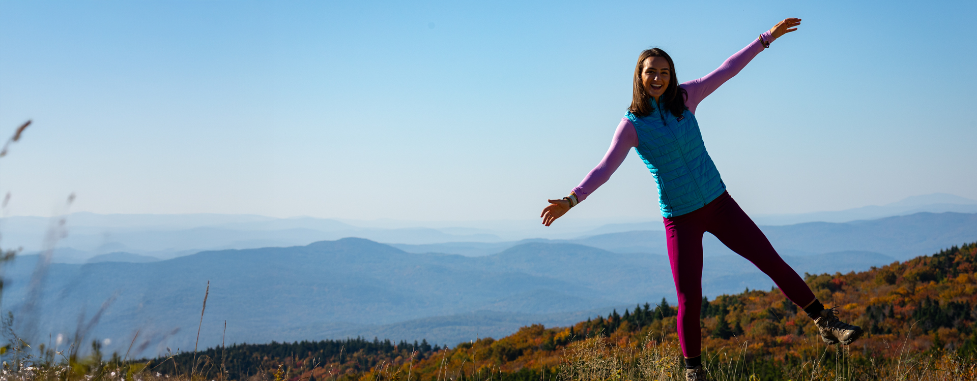 young woman hiking on kearsarge