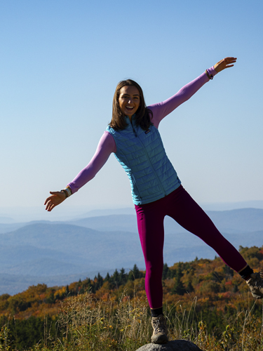 young woman hiking on kearsarge