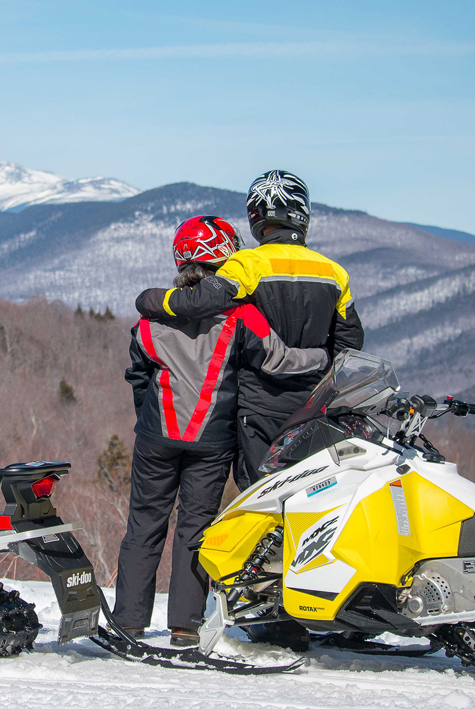snowmobiles on a snowy track