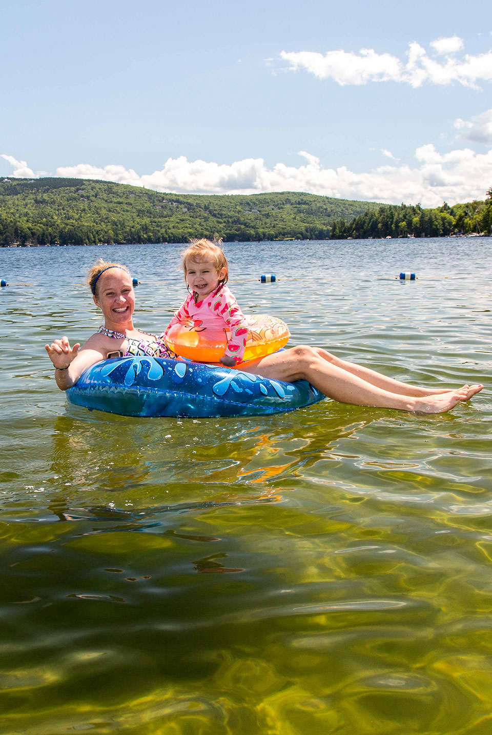 People swimming in a lake