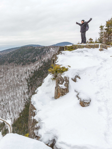 hiker in dixville notch state park