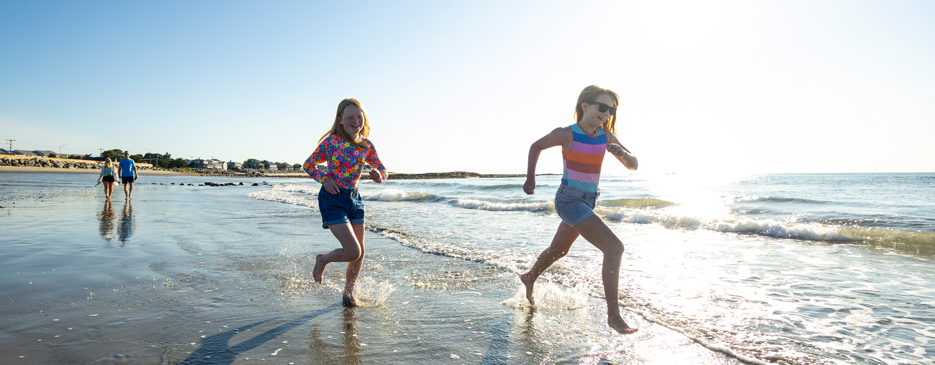 two girls running on north beach hampton