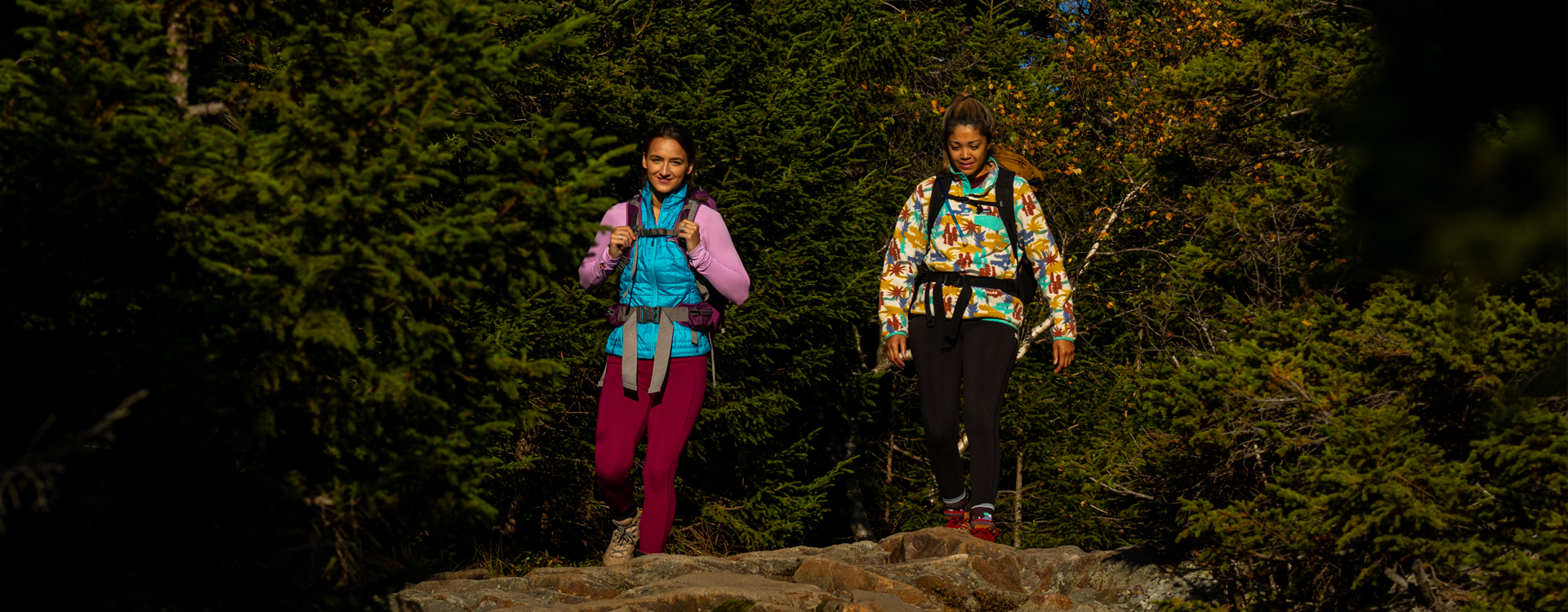 two young women hiking at rollins state park