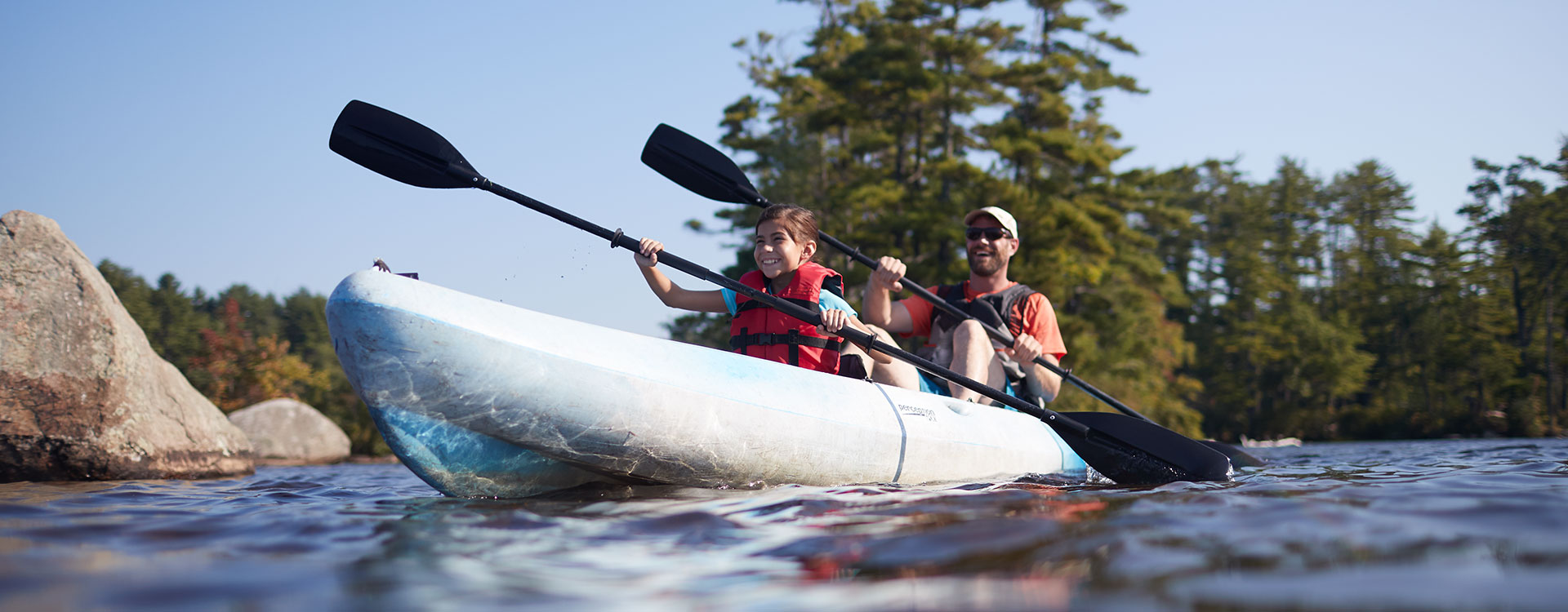 family kayaking