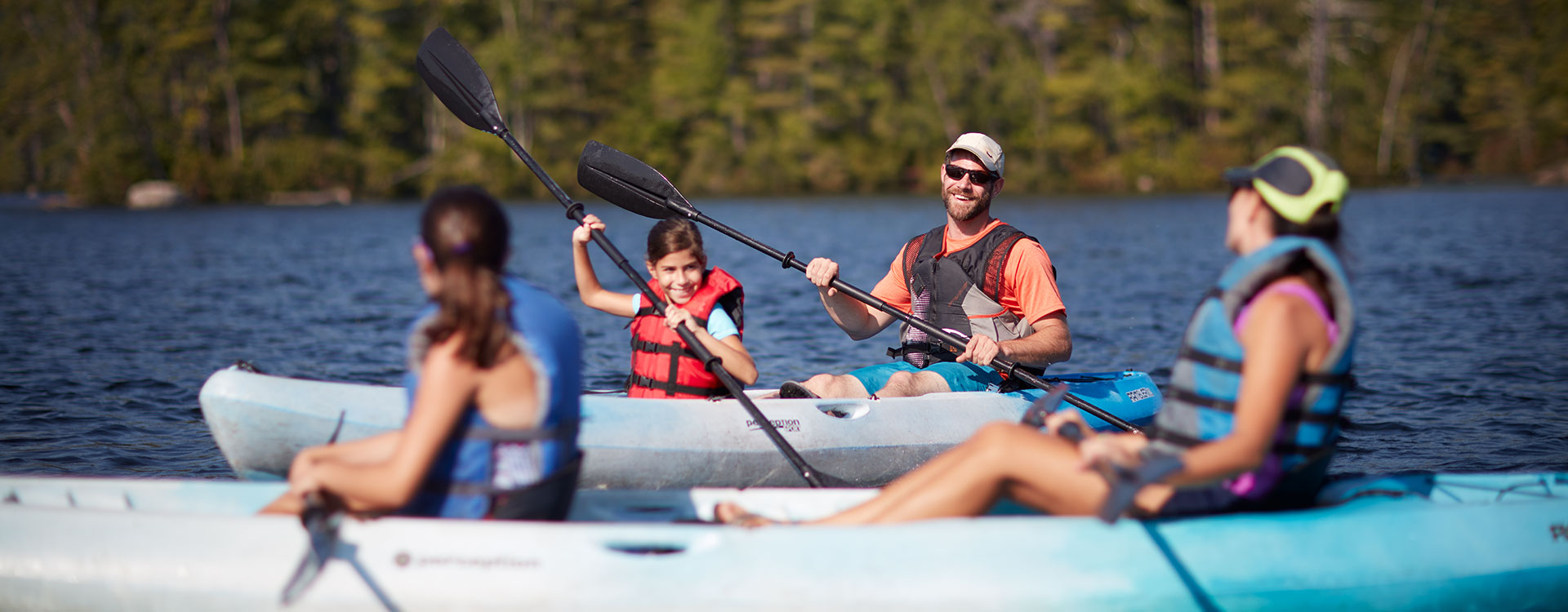 Family kayaking on pawtuckaway lake