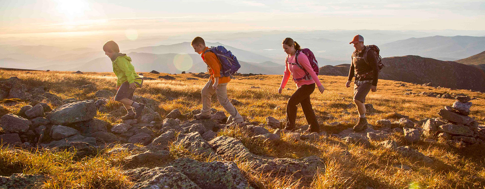 people hiking on mount washington