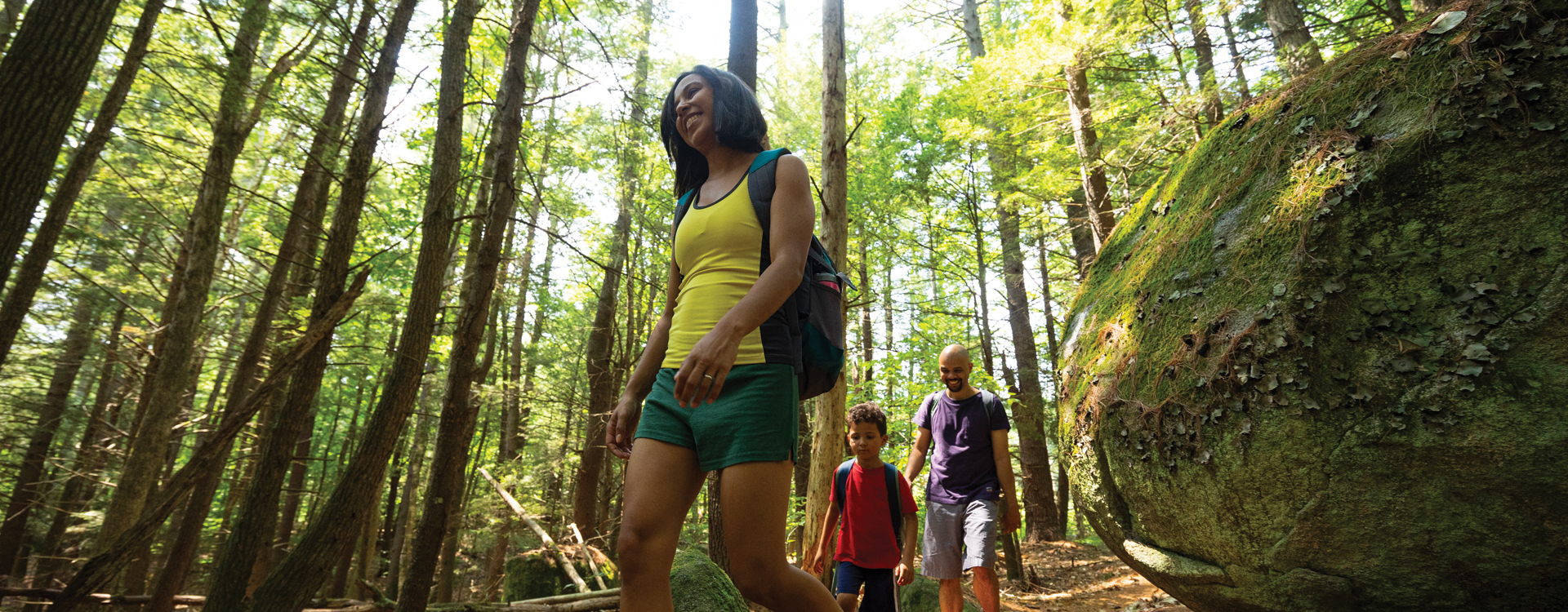 young family hiking at pawtuckaway state park