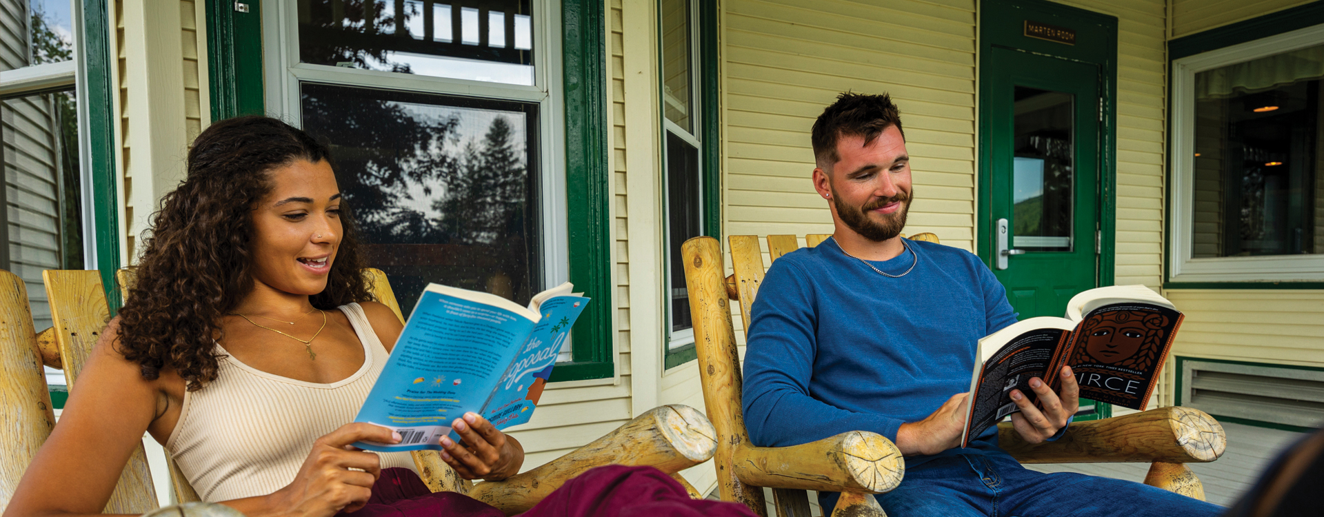 young couple on the deck at coleman lodge